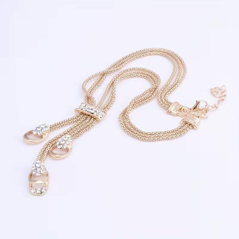 „Wasserfall“ – Luxuriöses Schmuckset in Goldtönen mit Kaskadendesign und Kristallstrass – 4-teilig