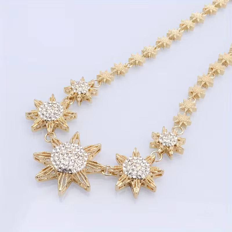 Statement-Set mit Halskette, Armband, Ohrringen und Ring in Sternform